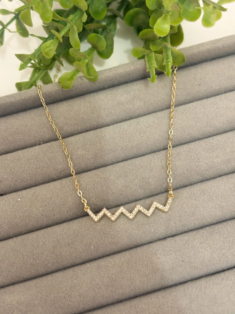 Corrente zig zag dourada